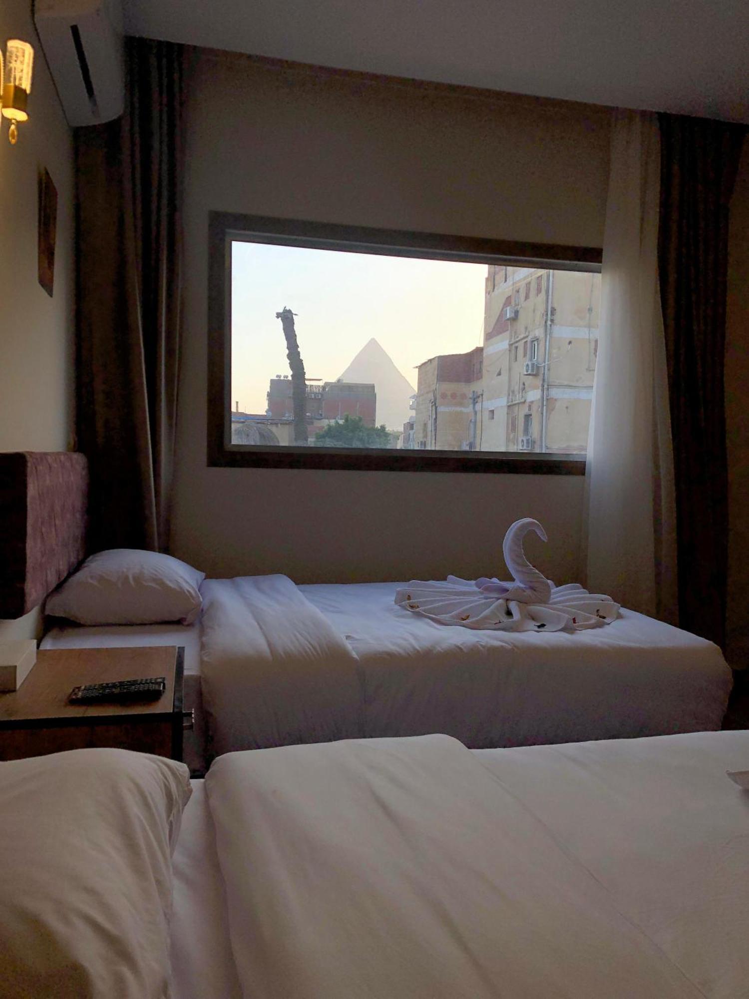 The View Pyramids Hotel Kafret el-Gabal Buitenkant foto