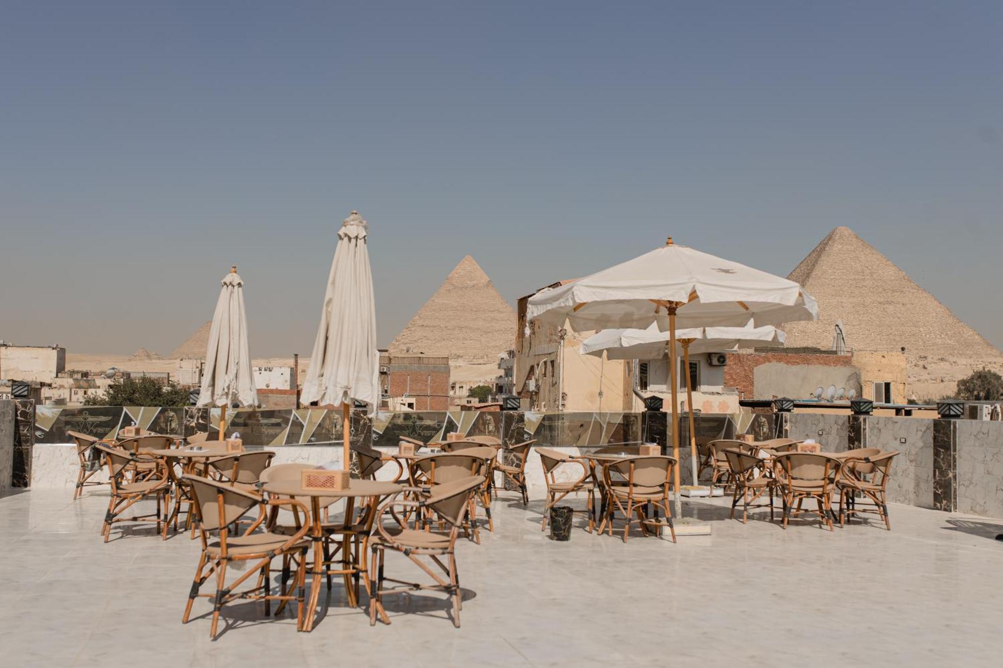 The View Pyramids Hotel Kafret el-Gabal Buitenkant foto