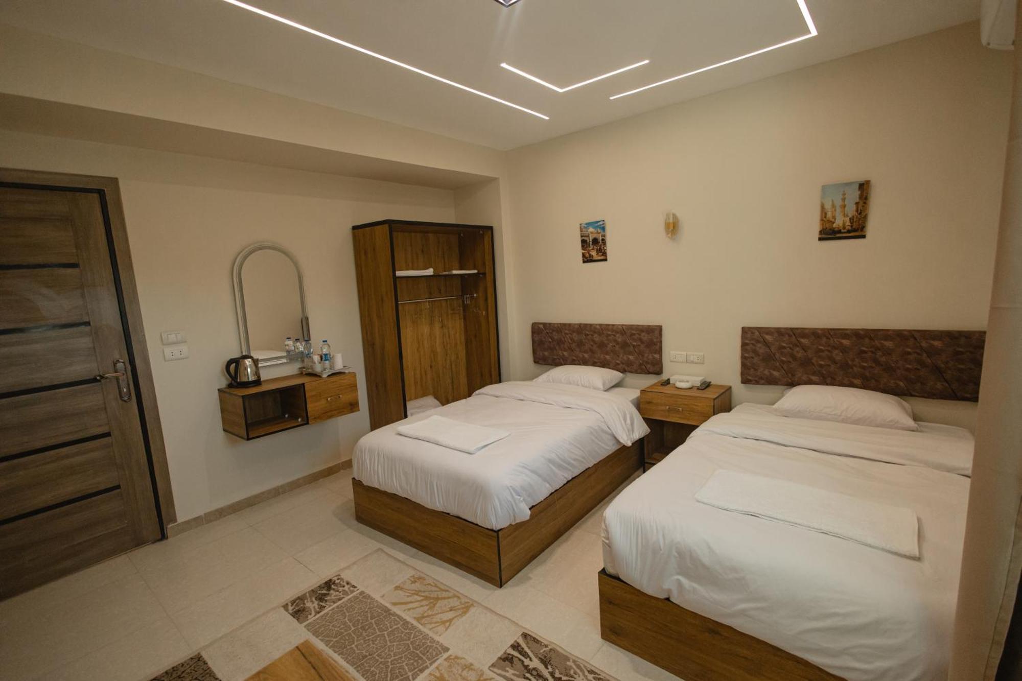 The View Pyramids Hotel Kafret el-Gabal Buitenkant foto