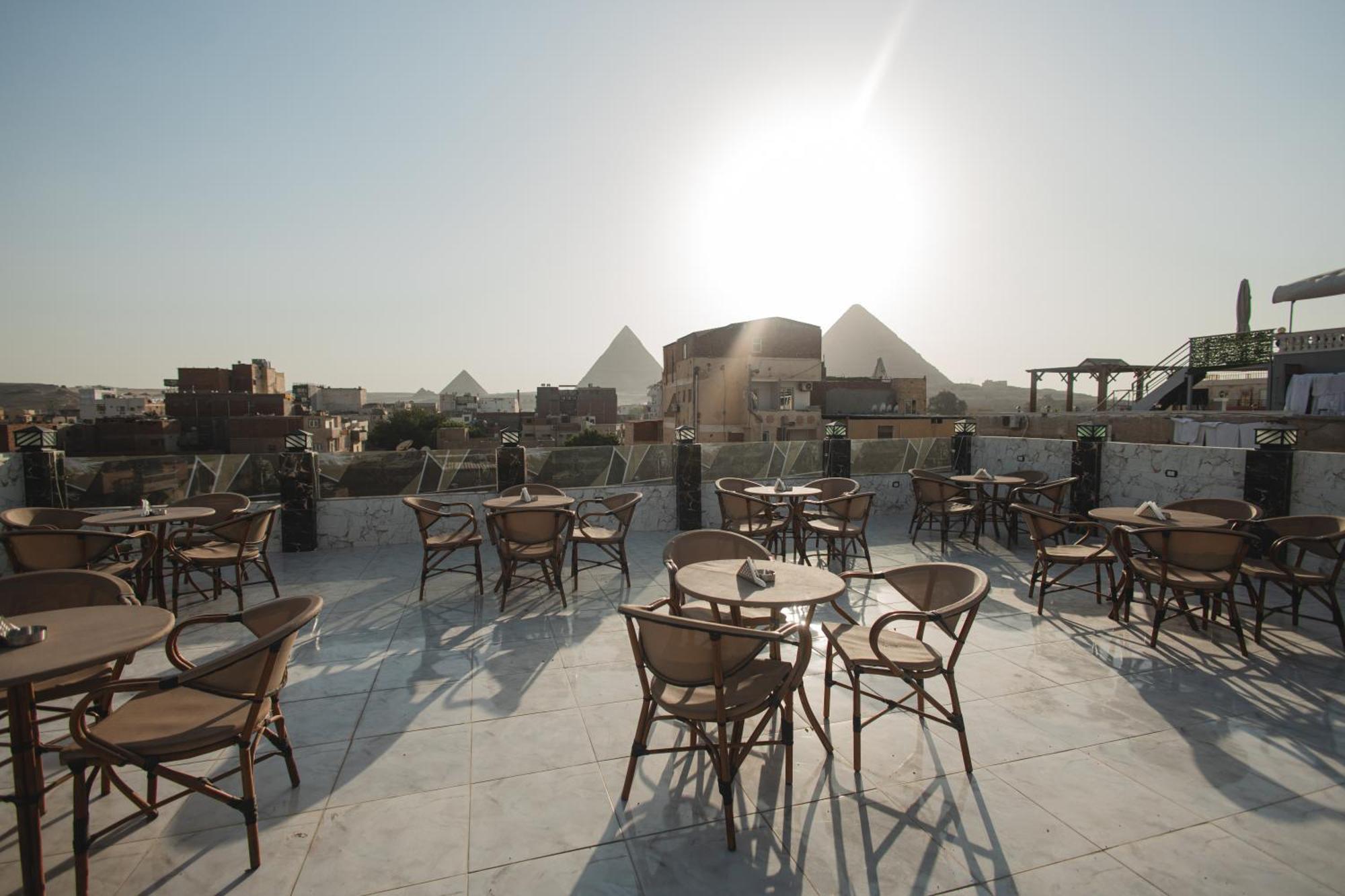 The View Pyramids Hotel Kafret el-Gabal Buitenkant foto